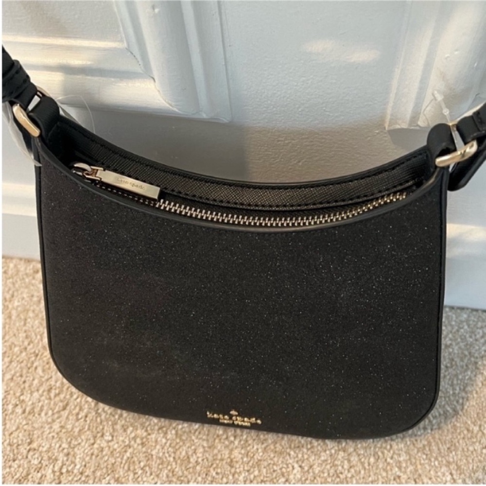 Kate Spade 8.4" × 8.8" × 1.6" Black
Shoulder Bag - Picture 10 of 12